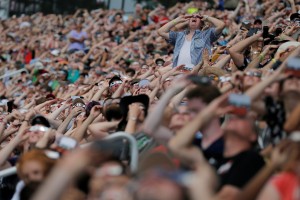 Guests watch the final moments before the total eclipse at the football stadium at Southern Illinois University in Carbondale, Illinois, U.S., August 21, 2017. Location coordinates for this image are 37°42'25" N 89°13'10" W. REUTERS/Brian Snyder